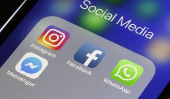 PARIS, FRANCE - MARCH 15: In this photo illustration, the logos of the messaging applications, WhatsApp, Instagram, Messenger and Facebook are displayed on the screen of an Apple iPhone on March 15, 2019 in Paris, France. Social media Facebook, Instagram, Messenger and WhatsApp have been affected by a global outage for nearly 24 hours on March 14, 2019 cutting virtual worlds to nearly 2.3 billion potential users. Facebook has explained the causes of malfunctions that have disrupted its networks in recent days. This failure is due to the "server configuration change" that has caused cascading problems Facebook is excused for the inconvenience caused to users and companies that are dependent on Facebook, Instagram or WhatsApp to run their business.(Photo by Chesnot/Getty Images)